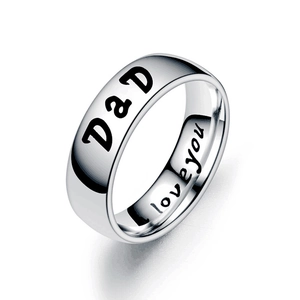 Polished stainless steel ring with Dad engraved on the outside and Love You on the inside