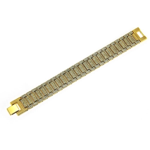 Detailed macro view of gold hip-hop bracelet with sparkling zircon crystals and clasp