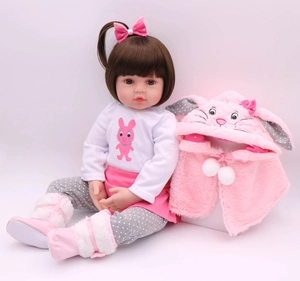 Detail of 47cm lifelike reborn doll in pink rabbit outfit with plush boots and cape