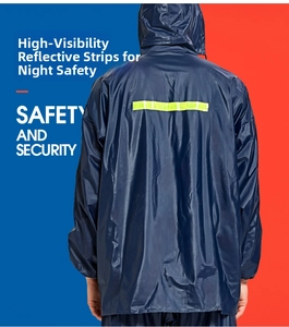 Detail showing the fluorescent yellow reflective strip on the back of the blue raincoat