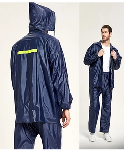 Front and back view of deep blue split raincoat set with yellow reflective safety strips