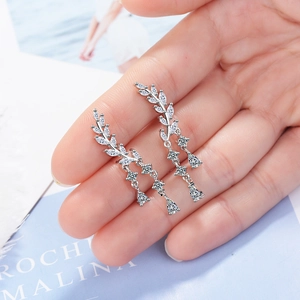 Elegant silver wing tassel earrings with leaf-shaped sparkling crystals for women