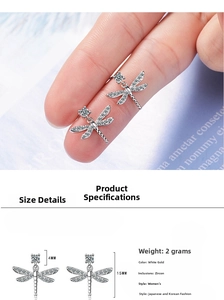 Macro shot of dragonfly stud earrings with silver plating and sparkling cubic zirconia