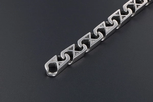 Close-up of titanium steel mesh bracelet featuring a unique X-shaped hollow design