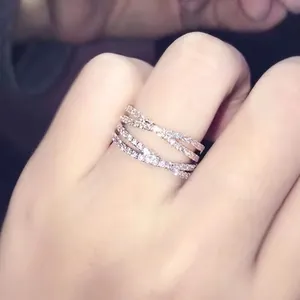 Crossed multi-layer ring in 18k rose gold with sparkling micro-pave zircons for women