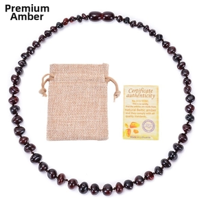 Polished Baltic amber baby necklace with linen pouch and certificate of authenticity