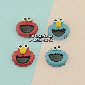 Macro detail of 3D resin cartoon character charms for DIY strawberry earring crafts