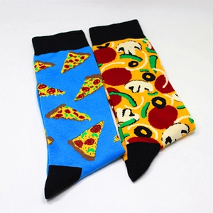 Detail view of cotton crew socks featuring creative pizza slice and topping patterns