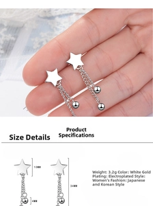 Detailed view of silver star tassel earrings with dimensions showing 34mm length
