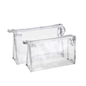 Set of two transparent PVC travel makeup bags with silver trim in different sizes