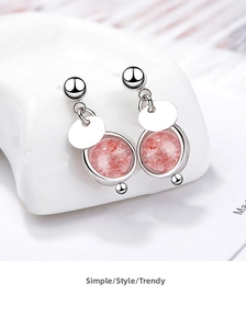 Detailed view of pink natural strawberry crystal drop earrings in S925 silver finish