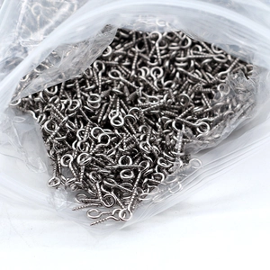 Bulk silver stainless steel eye pins for jewelry making shown in a clear plastic bag