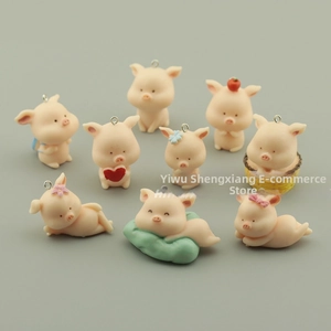 Detailed set of nine miniature pink resin pig pendants with metal hooks for DIY jewelry