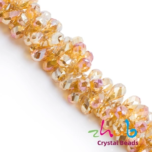 Detail of amber AB coated faceted teardrop crystal beads for DIY jewelry making