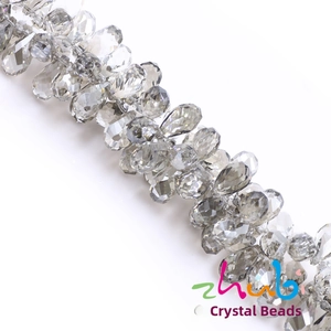 Detail of faceted grey teardrop crystal beads for DIY jewelry and necklaces