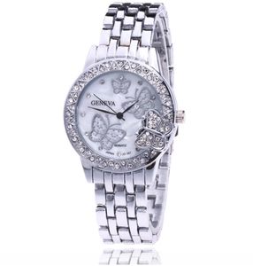 Detailed macro view of Geneva women's quartz watch with butterfly pattern and rhinestones