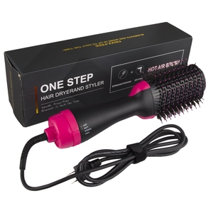 Detailed set of a black hot air brush styler with packaging and power cable accessories
