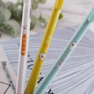 Close-up of colorful mechanical pencils featuring cute cartoon duck illustrations and text