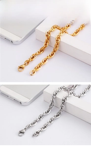 Detail of 18K gold and silver stainless steel twist rope chains with lobster clasps