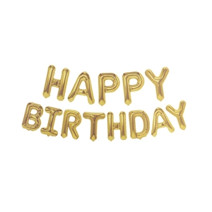 Close-up of golden Happy Birthday foil balloon letters with shiny metallic texture