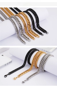 Detail of classic Cuban link necklaces in gold, silver, and black finish with lobster clasp