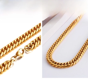 Detail of 18K gold plated Cuban link chain showing durable lobster clasp and links