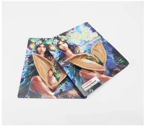 Detail view of latex elf ears for cosplay in hanging card package, soft flesh tone