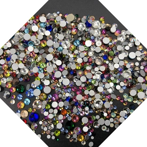 Close-up of mixed size and colorful flatback crystals for nail art decoration