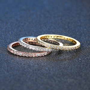 Three-piece stackable eternity rings in gold, silver, and rose gold with pavé zircon