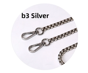 Close-up of silver box chain strap with lobster clasp for women's handbags