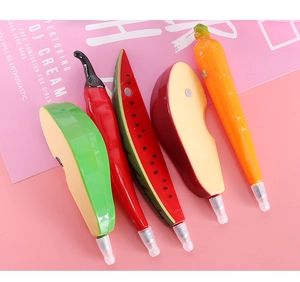 Macro shot of novelty fruit and vegetable pens including avocado and carrot shapes