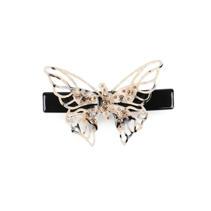 Elegant cutout acetate butterfly hair clip with rhinestones shown on a white background