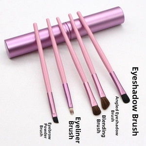Detailed view of 5-piece pony hair eye makeup brush set with purple metal storage tube