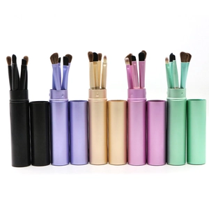 Detailed view of 5 portable horse hair eye makeup brush sets in various metallic colors