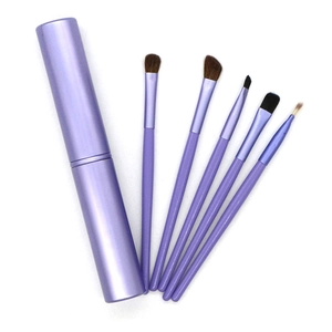 Detail of 5-piece purple horse hair eyeshadow brush set with metal storage tube