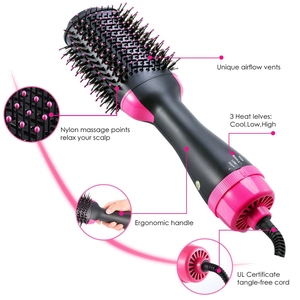 Pink multifunctional hot air brush with 3 heat settings and ergonomic handle design