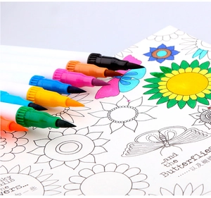 Detailed macro shot of dual-tip watercolor brush pens coloring a floral coloring book