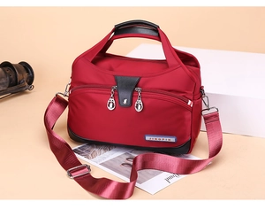 Red nylon canvas shoulder bag for women, large capacity crossbody handbag with top handle.