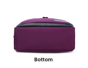 Detail view of the durable purple nylon bottom with reinforced black leather trims
