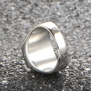 Macro view showing the polished inner surface and thick width of this men's steel ring