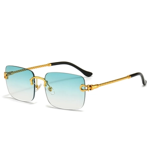 Frameless square sunglasses with light blue gradient lenses and gold twisted metal legs