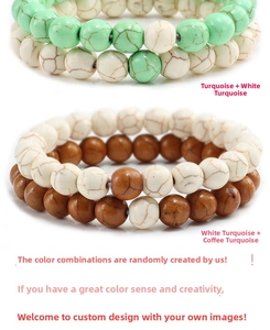Detail of bohemian turquoise beaded bracelet set featuring white and brown stone beads