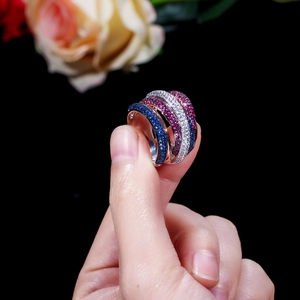 Multilayer rose gold ring with vibrant micro-pave blue white and pink zircon crystals