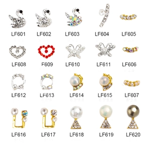 Detailed catalog of star and heart alloy nail art charms with pearls and zircons