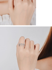 Silver double-layer star ring for women featuring cubic zirconia worn on finger