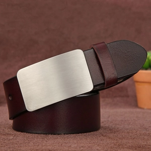 Close-up of a brown genuine leather belt with a brushed metal pin buckle for men
