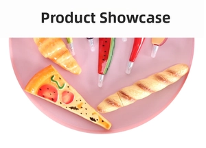 Detailed view of novelty food-shaped ballpoint pens featuring pizza and baguette designs