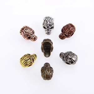 Vintage alloy skull beads in multiple antique metal finishes for DIY jewelry making and crafts