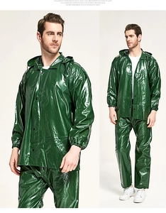 Detail of dark green waterproof split raincoat suit with hood and elastic cuffs