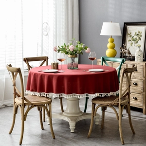 Waterproof solid red round tablecloth with white tassel trim for dining or coffee table